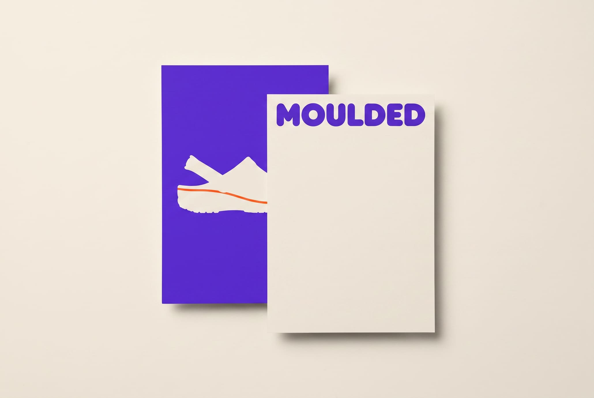 Two overlapping printed cards, a cream MOULDED poster over an ultraviolet clog silhouette card.