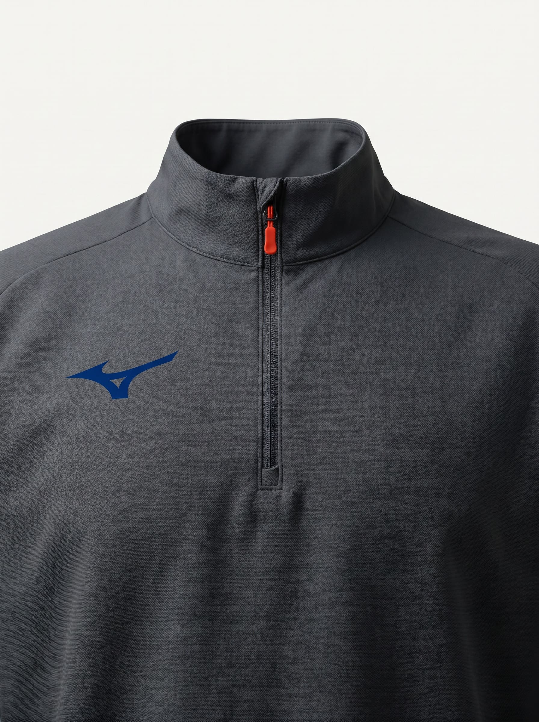 A graphite half-zip technical jacket, shaped as a hollow ghost-mannequin form with closed collar and cuffs, on bone seamless with a small blue Runbird at the chest.