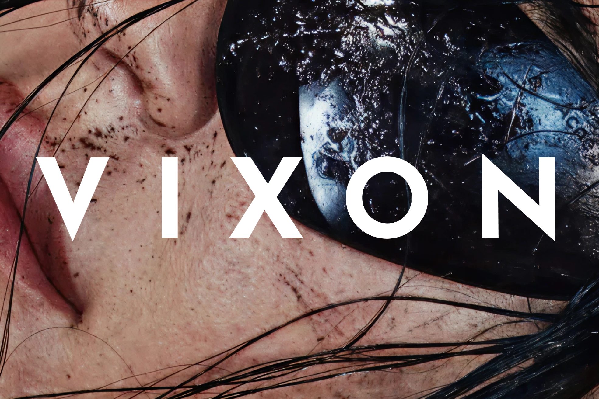 A large white Vixon wordmark over a close-up portrait with reflective sunglasses